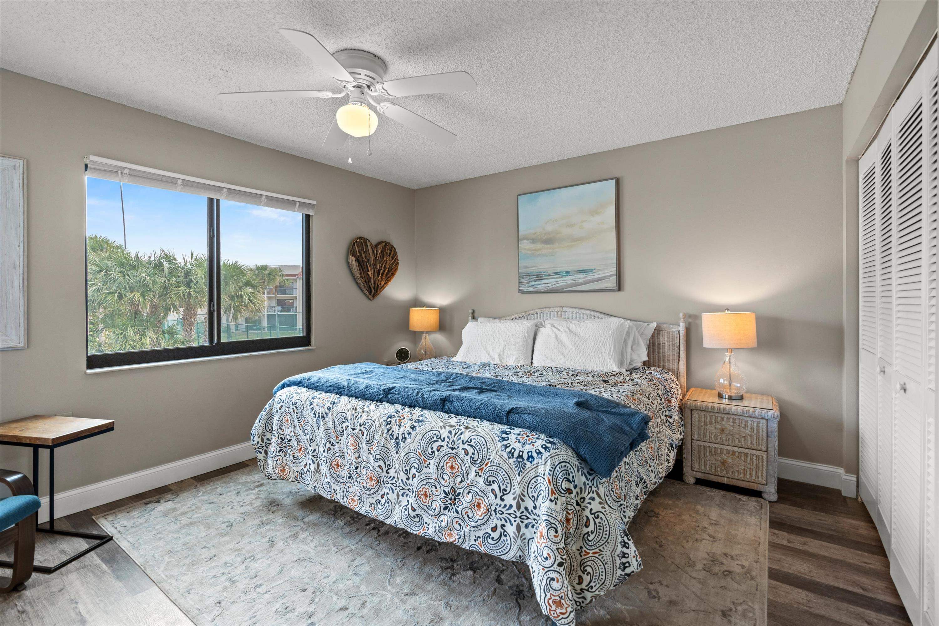 4250 A1a South E26 St. Augustine, FL 32080 - Photo 15 of 42 a bedroom with a bed and a window