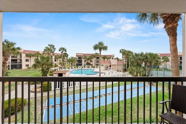 a view of balcony with furniture