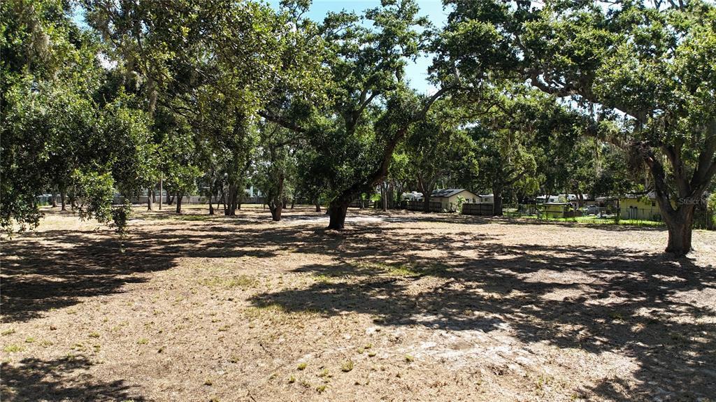 0 51st Street Sarasota, FL 34234 - Photo 16 of 20 a view of road space with trees