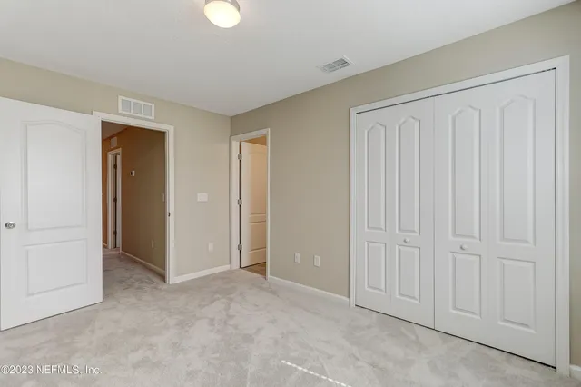 an empty room with closet