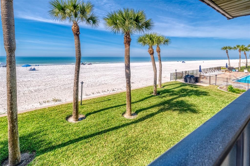 60 Gulf Boulevard, Unit 204 Indian Rocks Beach, FL 33785 - Photo 15 of 45 a view of a garden from a window