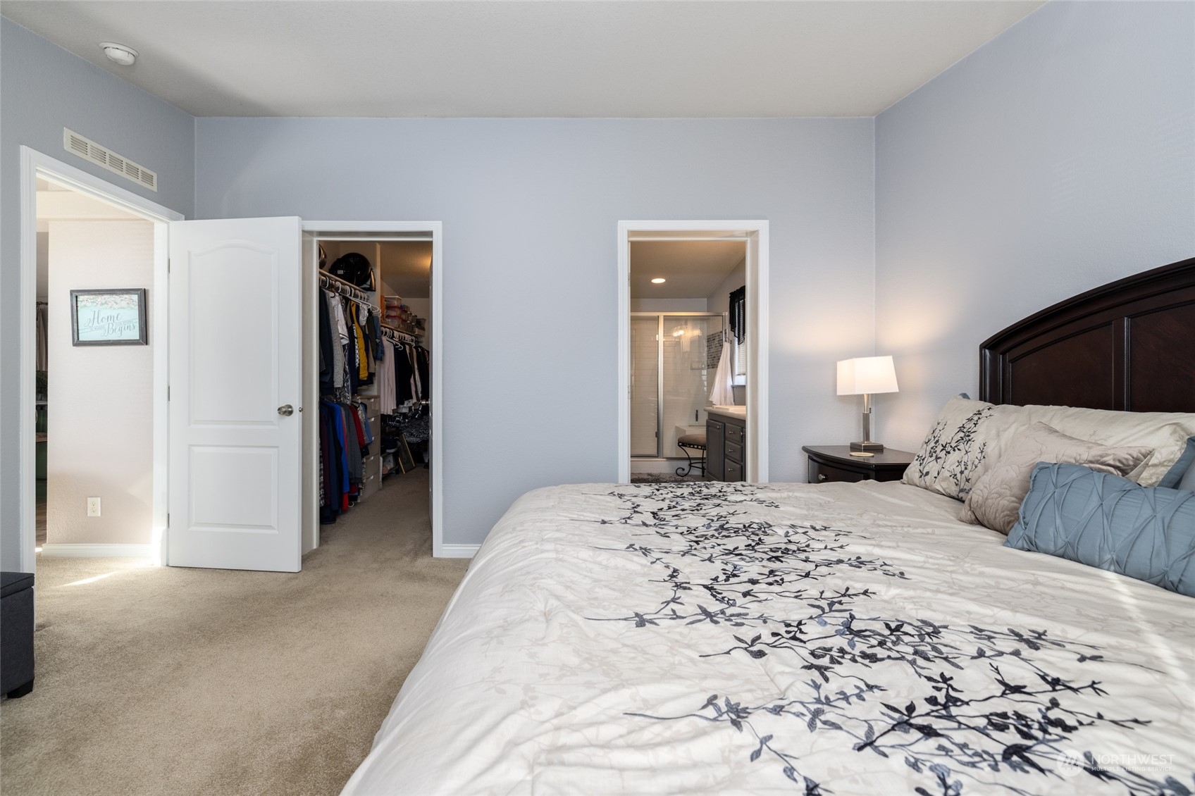 107 South Pass Road, Unit 3 Nooksack, WA 98276 - Photo 16 of 38 a bedroom with a bed and a large mirror