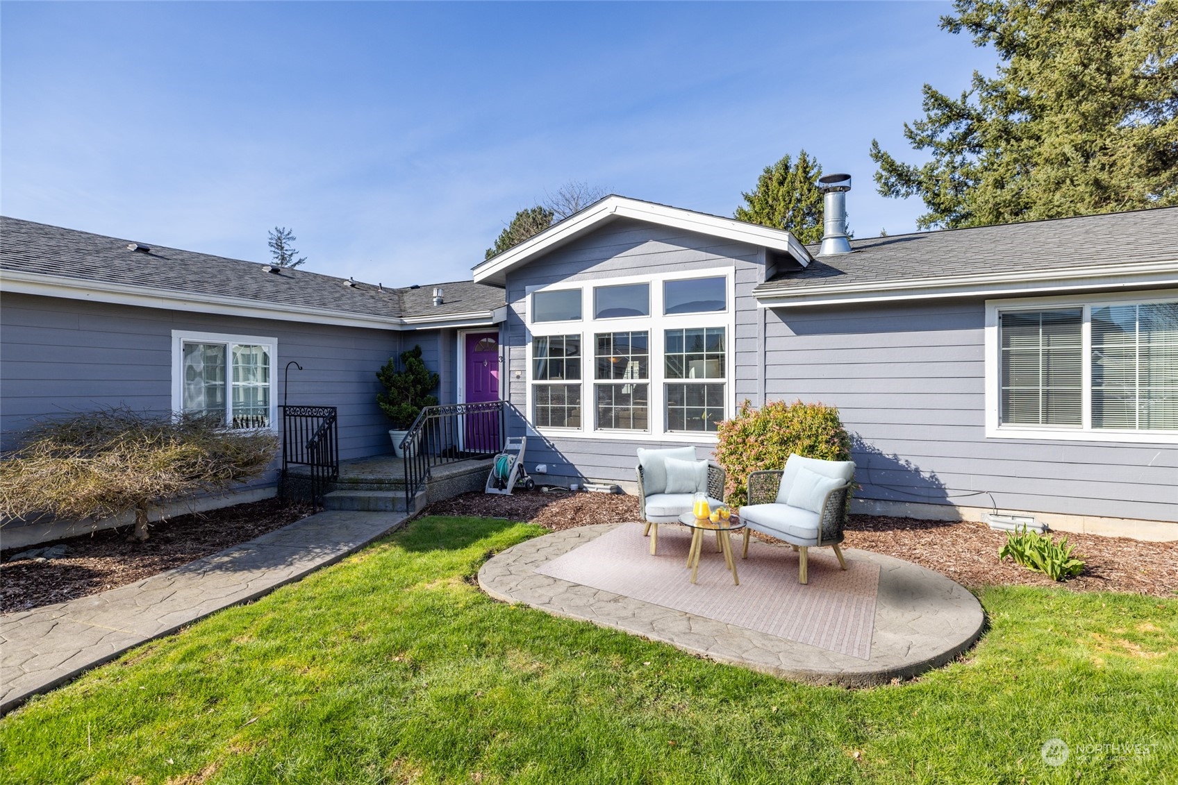 107 South Pass Road, Unit 3 Nooksack, WA 98276 - Photo 2 of 38 a backyard of a house with seating space