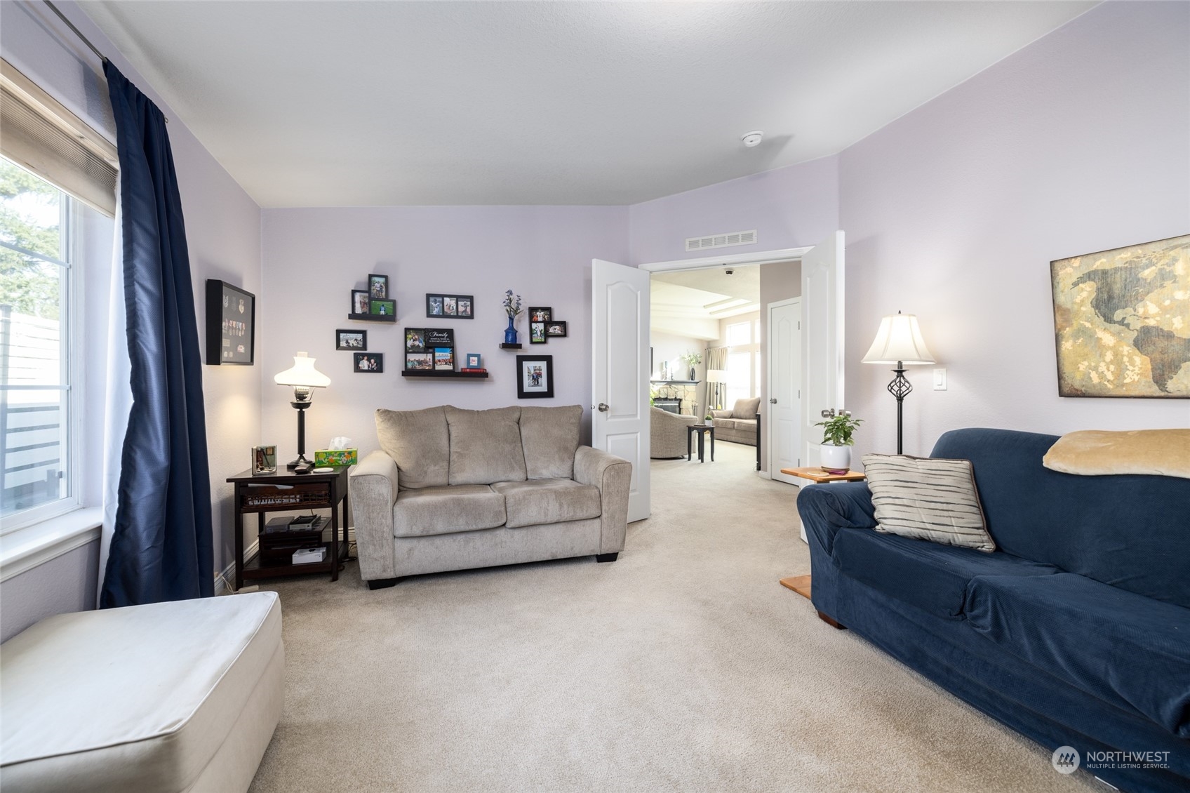 107 South Pass Road, Unit 3 Nooksack, WA 98276 - Photo 22 of 38 a living room with furniture and a flat screen tv