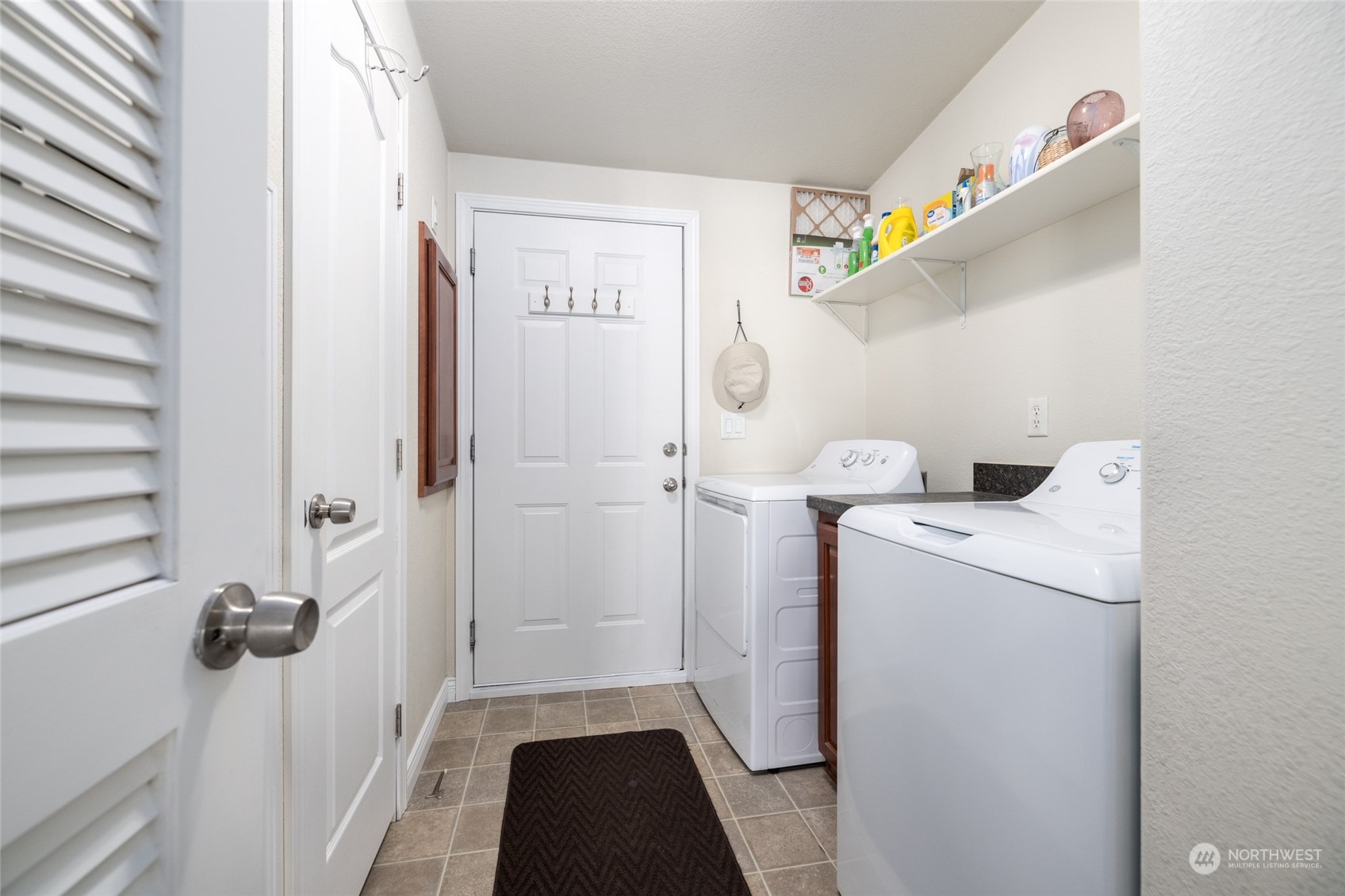 107 South Pass Road, Unit 3 Nooksack, WA 98276 - Photo 23 of 38 a view of a storage & utility room with a washer dryer