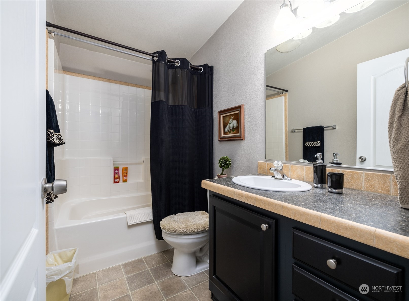 107 South Pass Road, Unit 3 Nooksack, WA 98276 - Photo 24 of 38 a bathroom with a granite countertop sink toilet and shower
