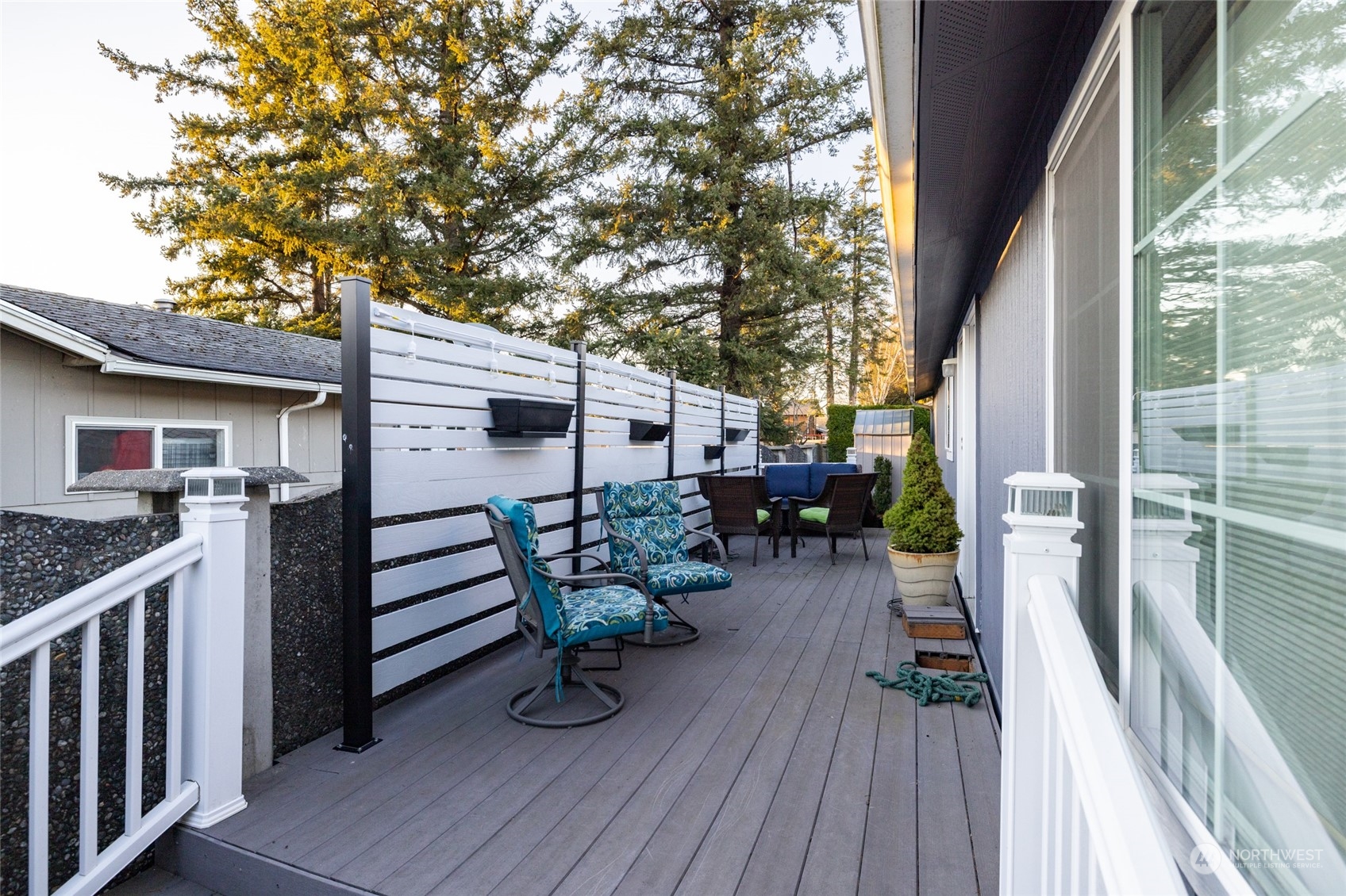 107 South Pass Road, Unit 3 Nooksack, WA 98276 - Photo 32 of 38 a view of house with deck outdoor seating and wooden floor