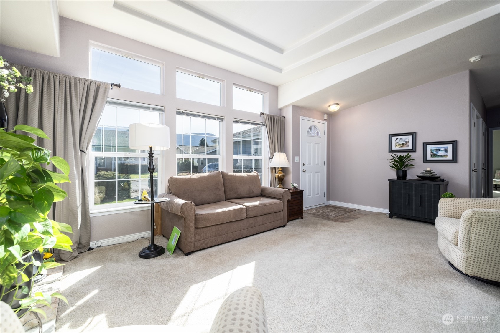 107 South Pass Road, Unit 3 Nooksack, WA 98276 - Photo 5 of 38 a living room with furniture and a large window