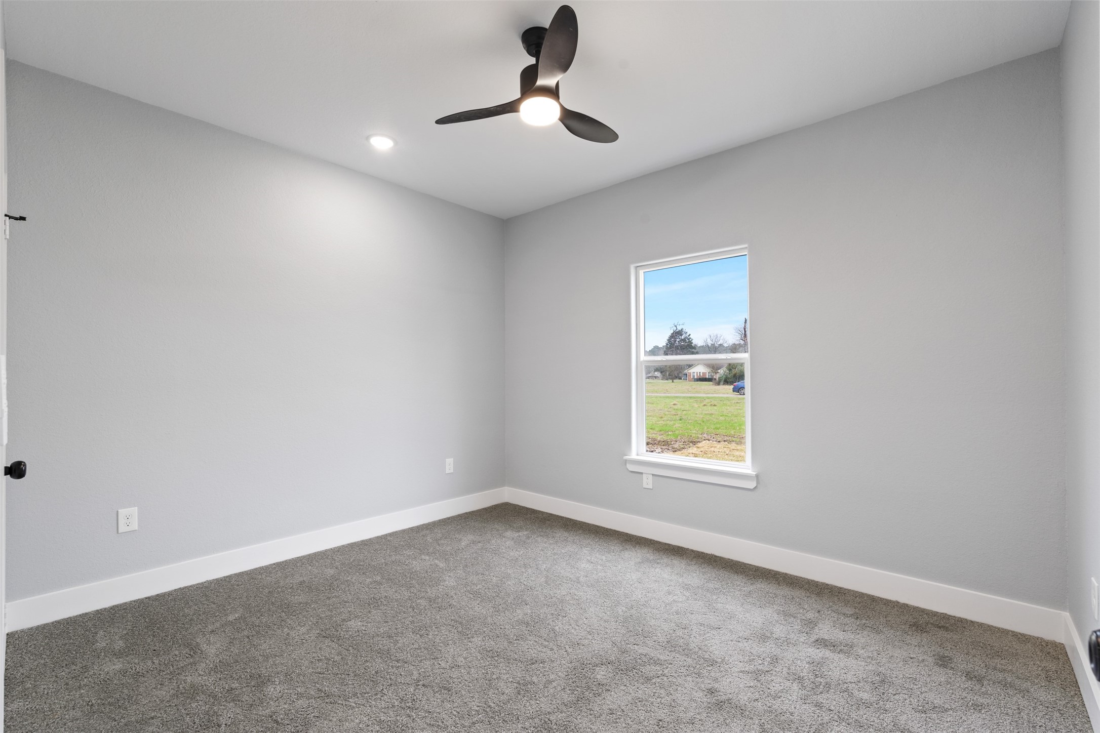 7 Meadowview Drive Trinity, TX 75862 - Photo 22 of 32 a view of an empty room with a window