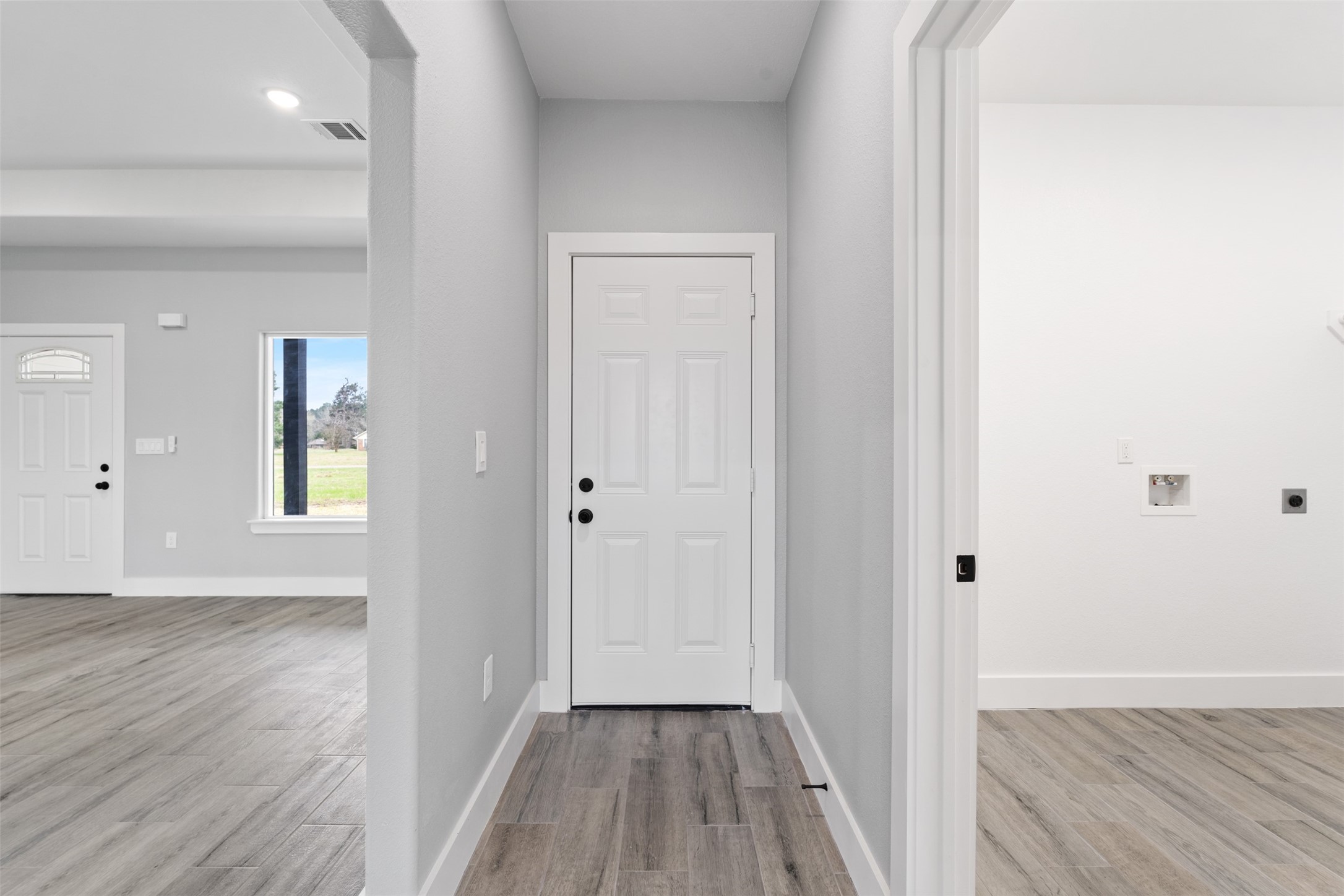 7 Meadowview Drive Trinity, TX 75862 - Photo 24 of 32 a view of a hallway with wooden floor