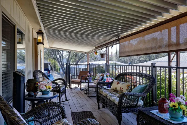 a outdoor living space with furniture and a potted plant