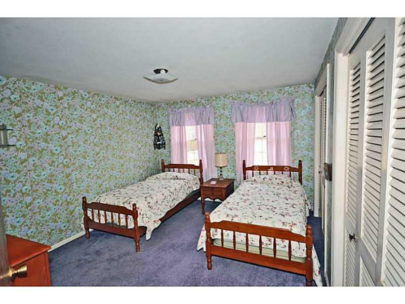 217 Hunt Road Fox Chapel, PA 15215 - Photo 12 of 24 Bedroom. Closets along the wall and large windows accent this great space.