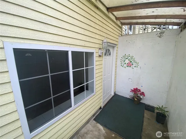 a view of a terrace with yard