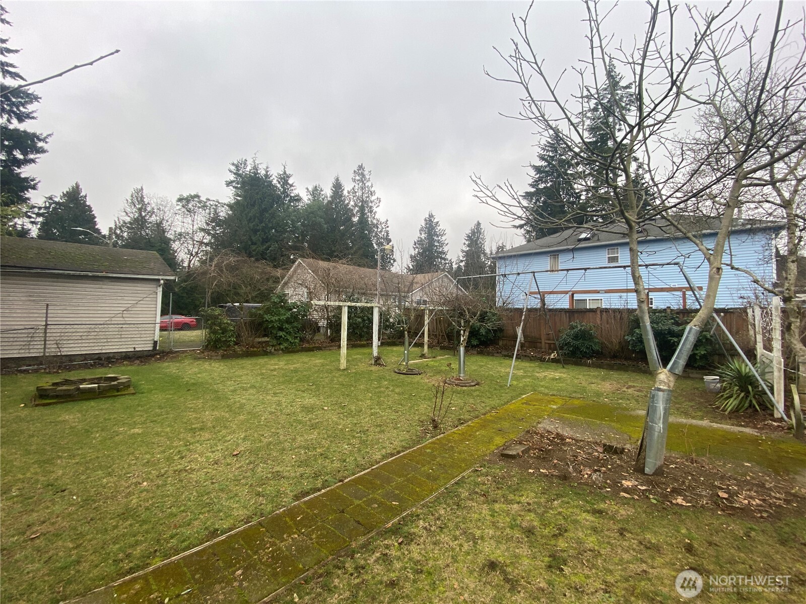 313 Northeast 185th Street Shoreline, WA 98155 - Photo 22 of 24 a view of a backyard