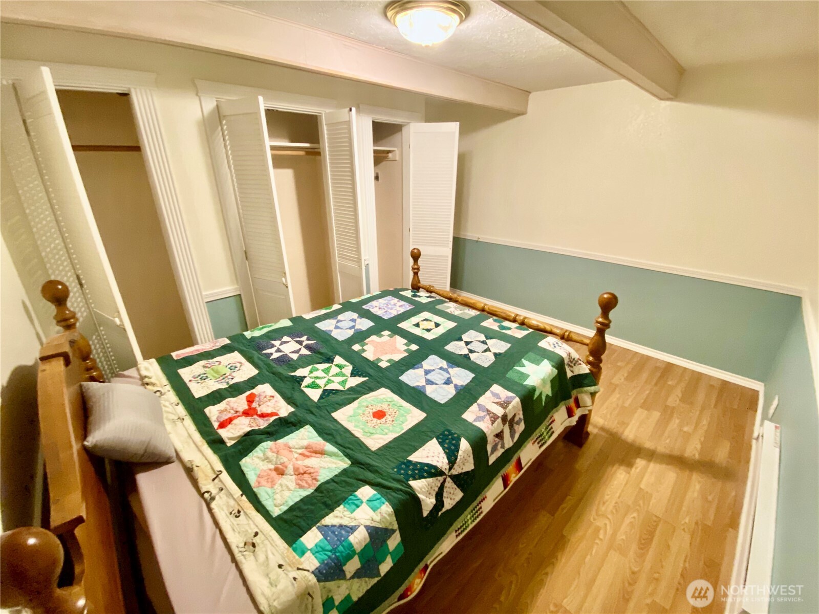 313 Northeast 185th Street Shoreline, WA 98155 - Photo 6 of 24 a bedroom with a bed and a window