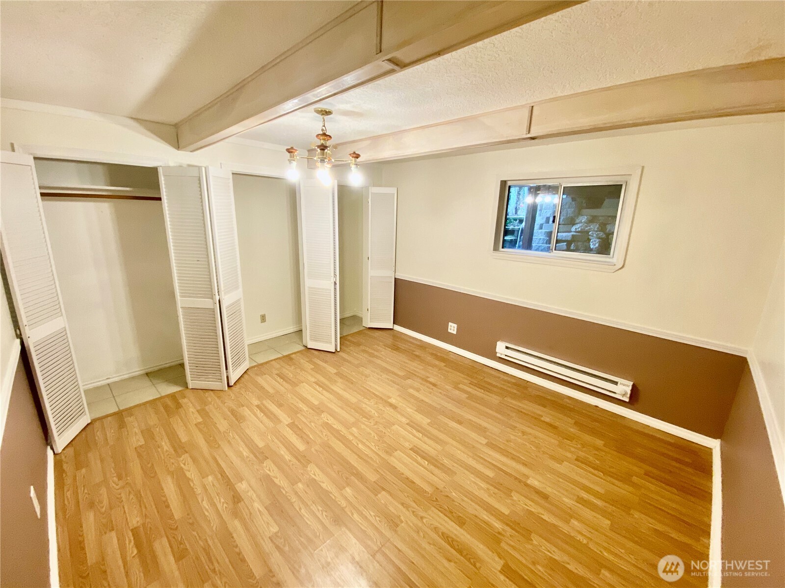 313 Northeast 185th Street Shoreline, WA 98155 - Photo 8 of 24 a view of a room with wooden floor