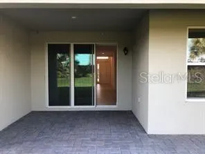 a view of a room with a large window