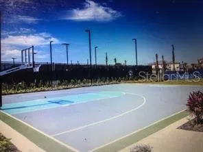 a view of a swimming pool with a yard