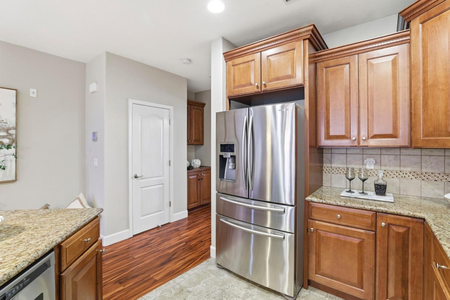1701 Shore Place, Unit 5 Santa Clara, CA 95054 - Photo 13 of 32 a kitchen with stainless steel appliances granite countertop a refrigerator and a sink
