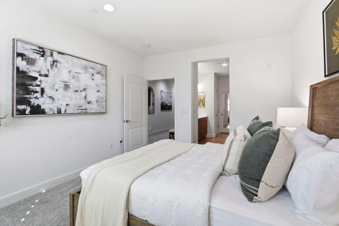 1701 Shore Place, Unit 5 Santa Clara, CA 95054 - Photo 17 of 32 a bedroom with a bed and painting on the wall