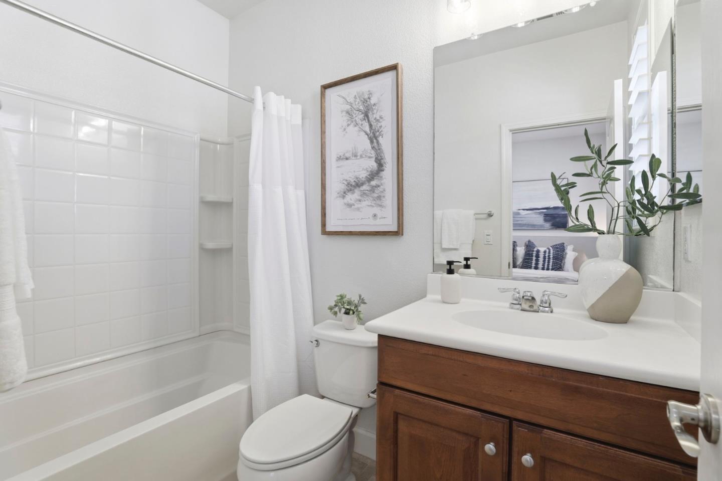 1701 Shore Place, Unit 5 Santa Clara, CA 95054 - Photo 22 of 32 a bathroom with a sink a toilet and shower