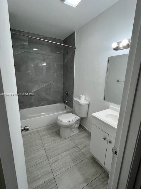 950 Constitution Drive, Unit 950A Homestead, FL 33034 - Photo 3 of 7 a bathroom with a toilet a sink and shower