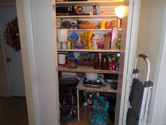 a store room with washer and dryer