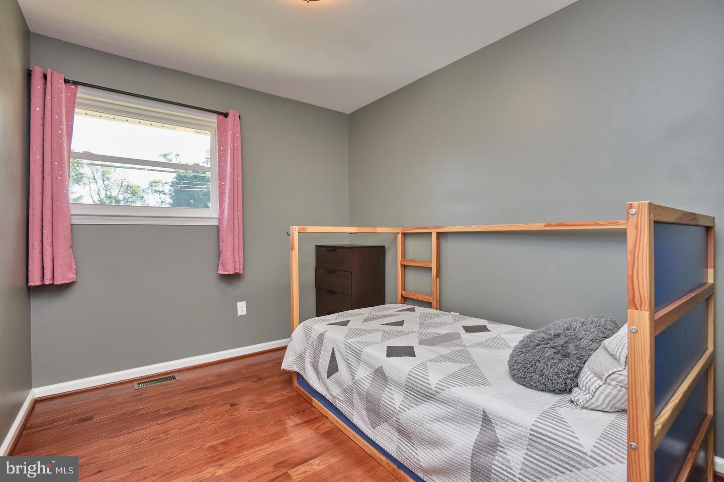 1007 Venice Drive Silver Spring, MD 20904 - Photo 23 of 39 a bedroom with a bed and window
