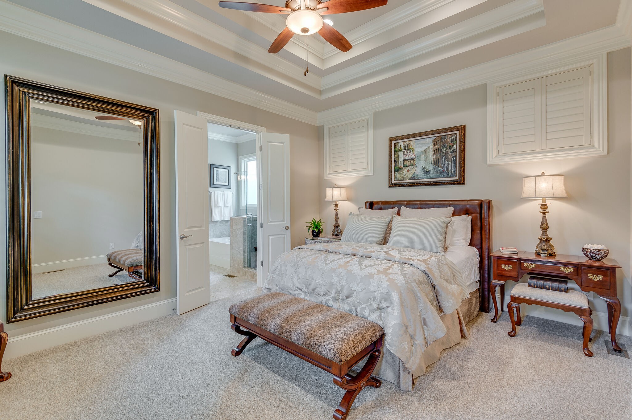 324 Fitzgerald Street Franklin, TN 37064 - Photo 18 of 39 a spacious bedroom with a bed and a chandelier