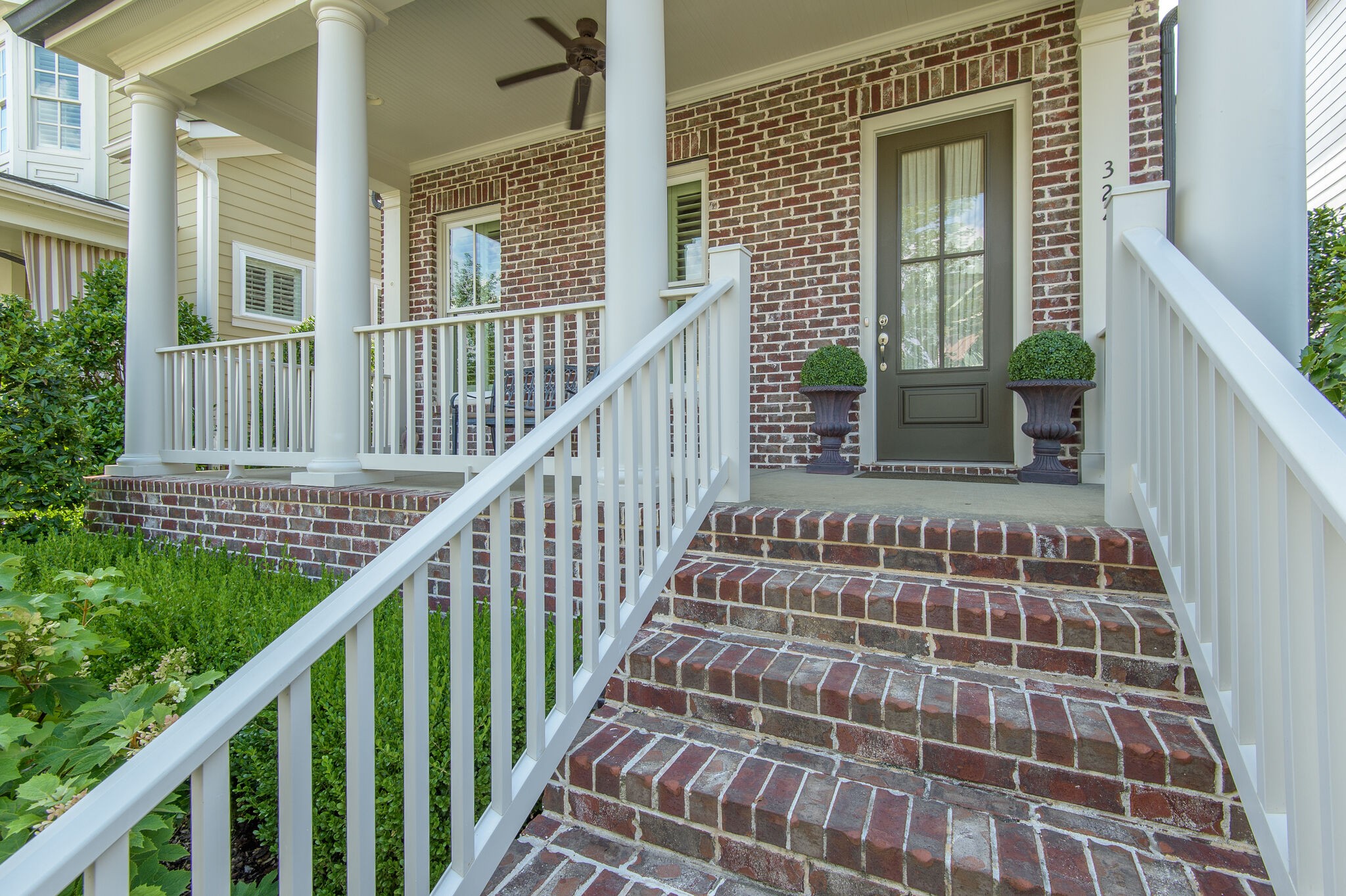 324 Fitzgerald Street Franklin, TN 37064 - Photo 2 of 39 a balcony view with a large window and wooden floor