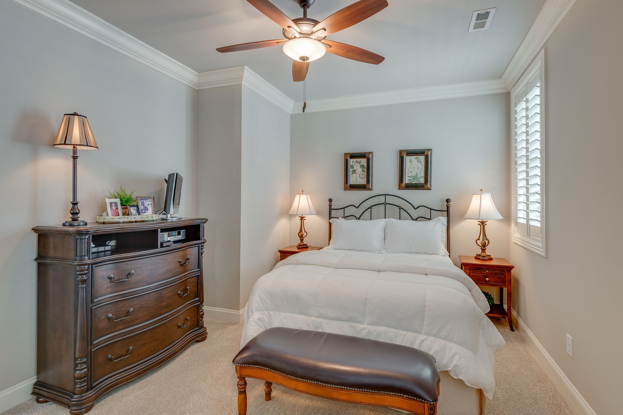 324 Fitzgerald Street Franklin, TN 37064 - Photo 28 of 39 a bedroom with a bed and a chandelier