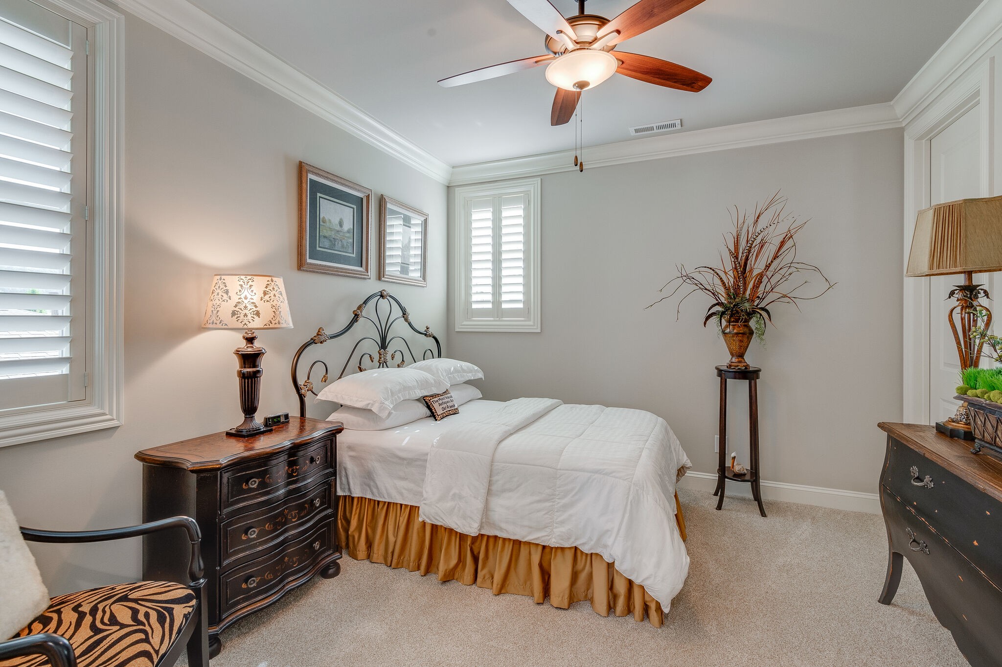 324 Fitzgerald Street Franklin, TN 37064 - Photo 29 of 39 a bedroom with a bed and a chandelier