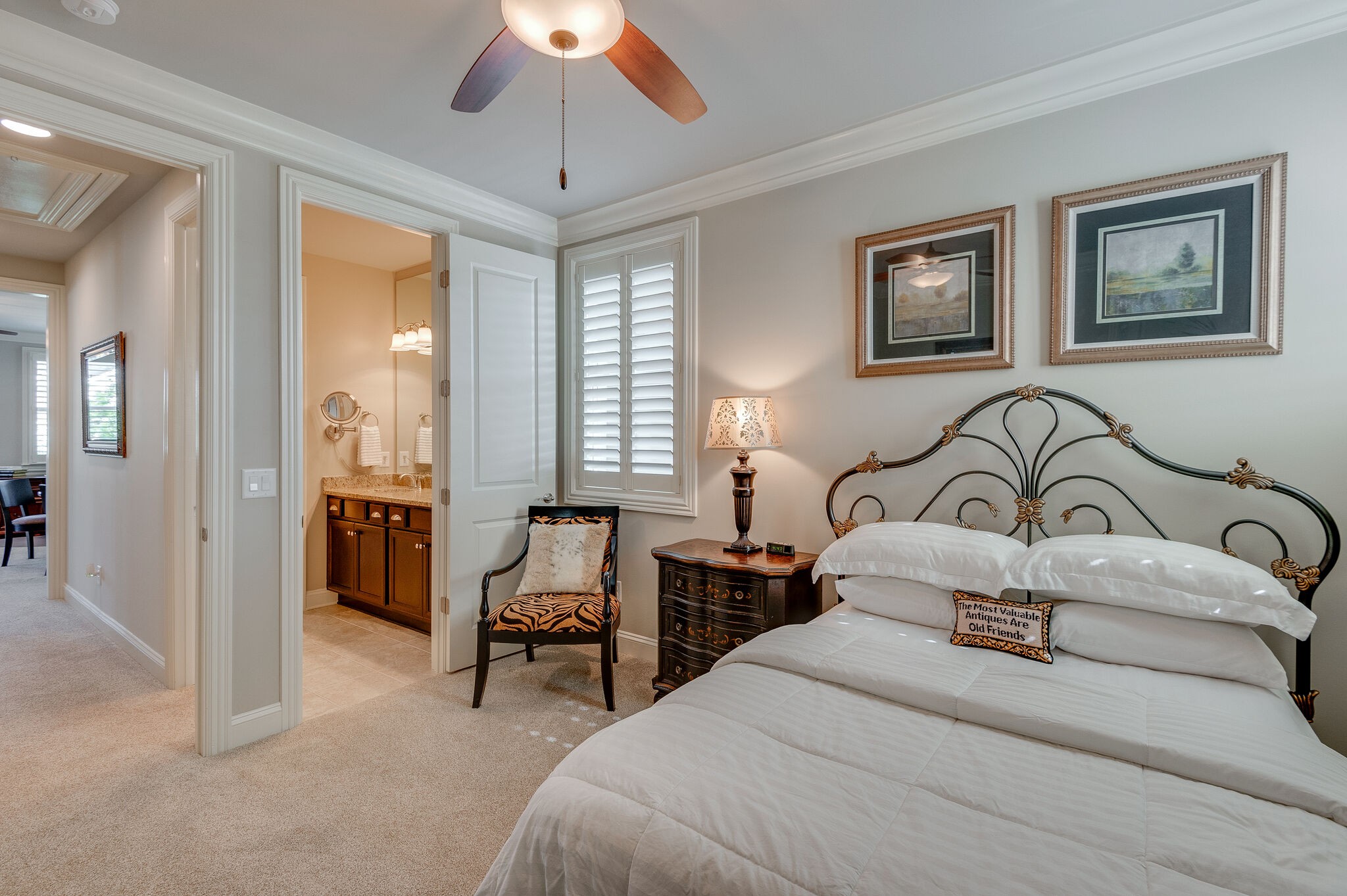 324 Fitzgerald Street Franklin, TN 37064 - Photo 30 of 39 a bedroom with bed and a chandelier