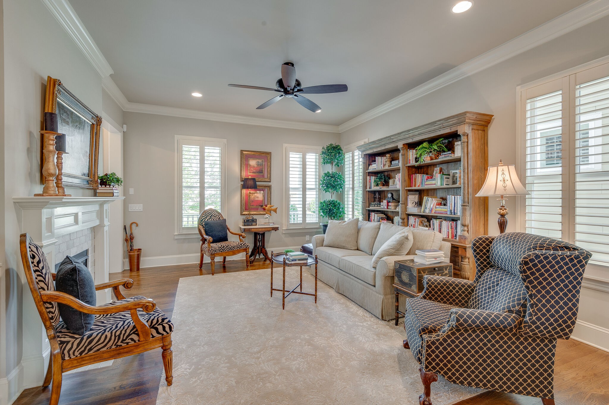 324 Fitzgerald Street Franklin, TN 37064 - Photo 5 of 39 a living room with furniture a fireplace and a large window