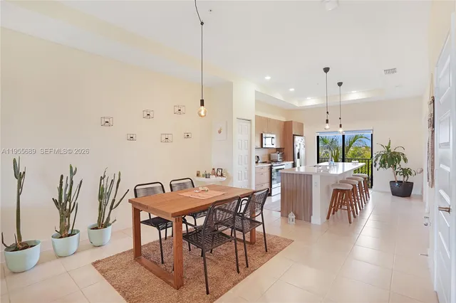 a view of a dining room with furniture