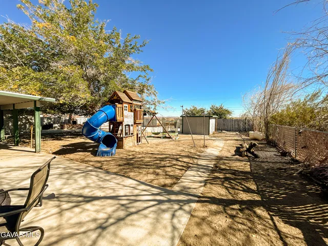 a view of backyard with green space