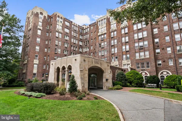 a front view of a building with garden