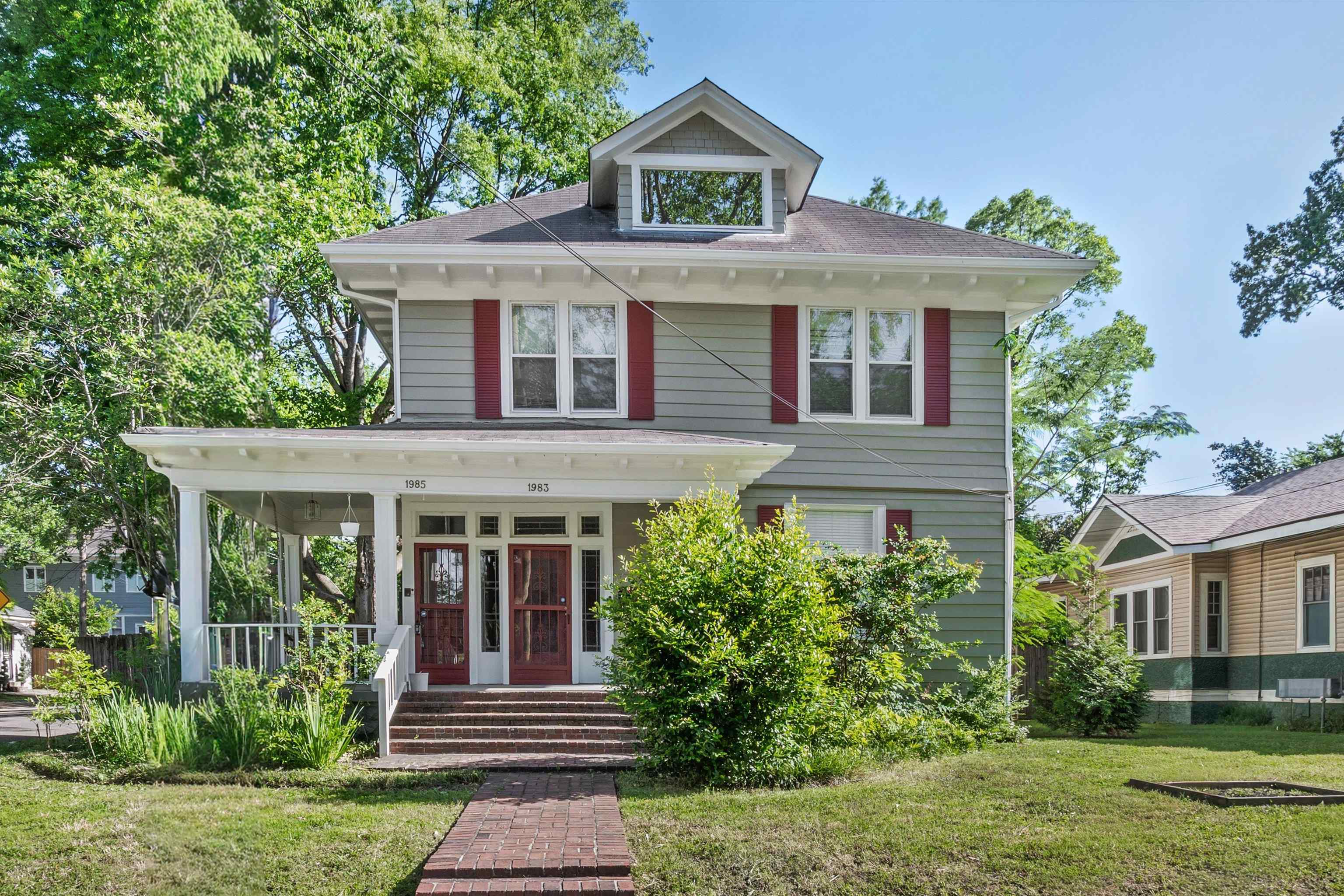 1983 Harbert Avenue Memphis, TN 38104 - Photo 1 of 40 front view of a house with a yard