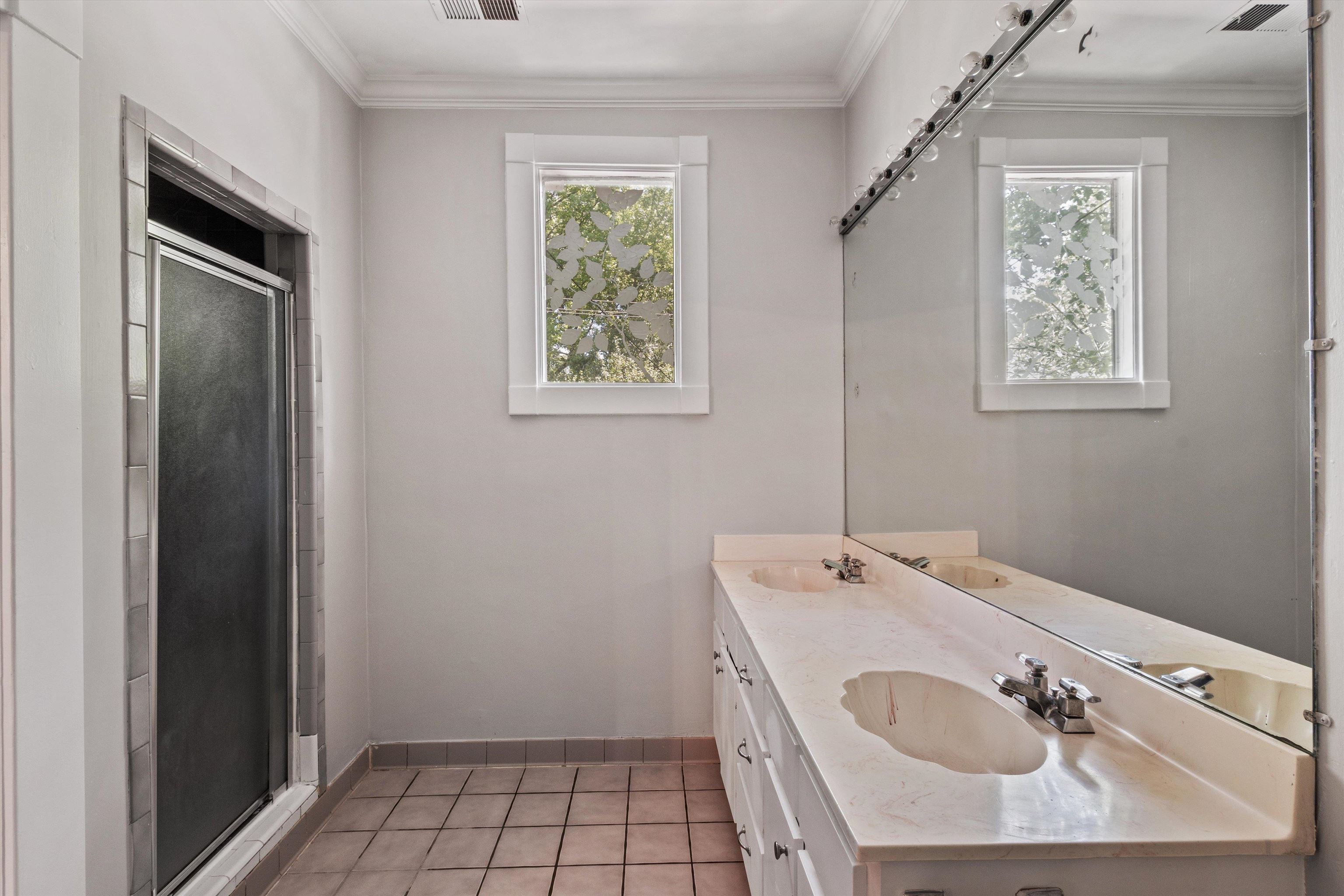 1983 Harbert Avenue Memphis, TN 38104 - Photo 26 of 40 a bathroom with a sink and a mirror