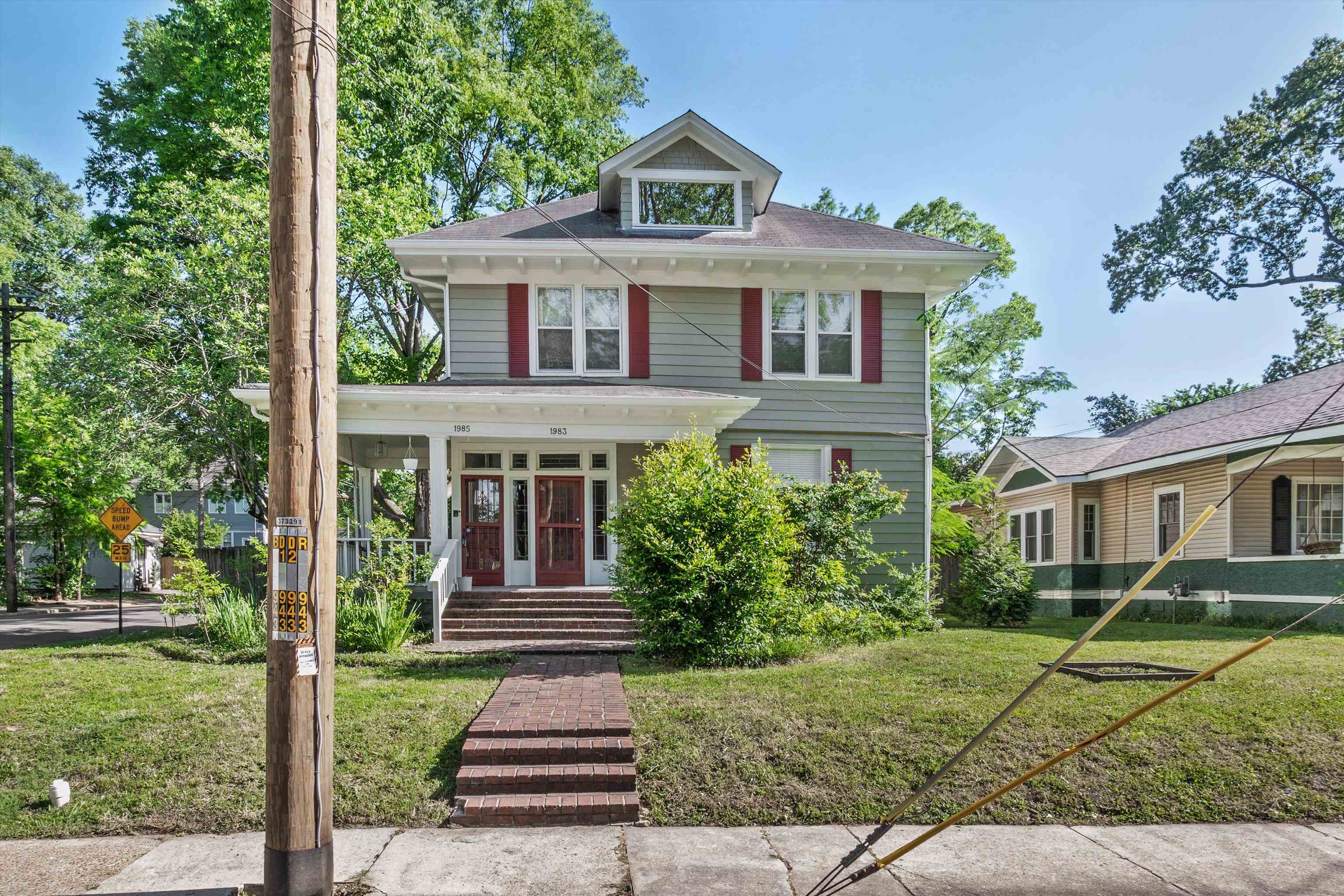 1983 Harbert Avenue Memphis, TN 38104 - Photo 32 of 40 front view of a house with a yard