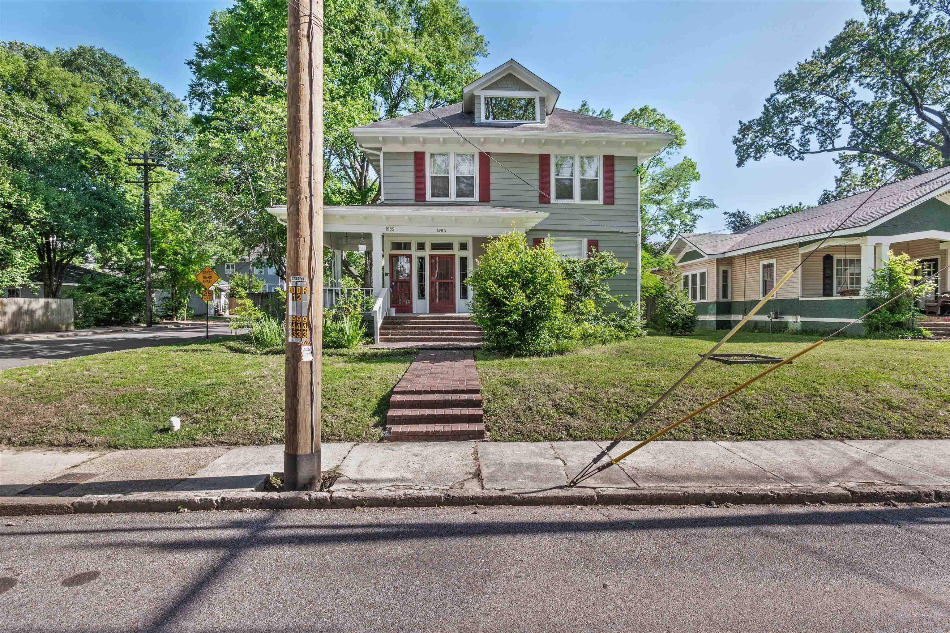 1983 Harbert Avenue Memphis, TN 38104 - Photo 33 of 40 a front view of a house with a yard