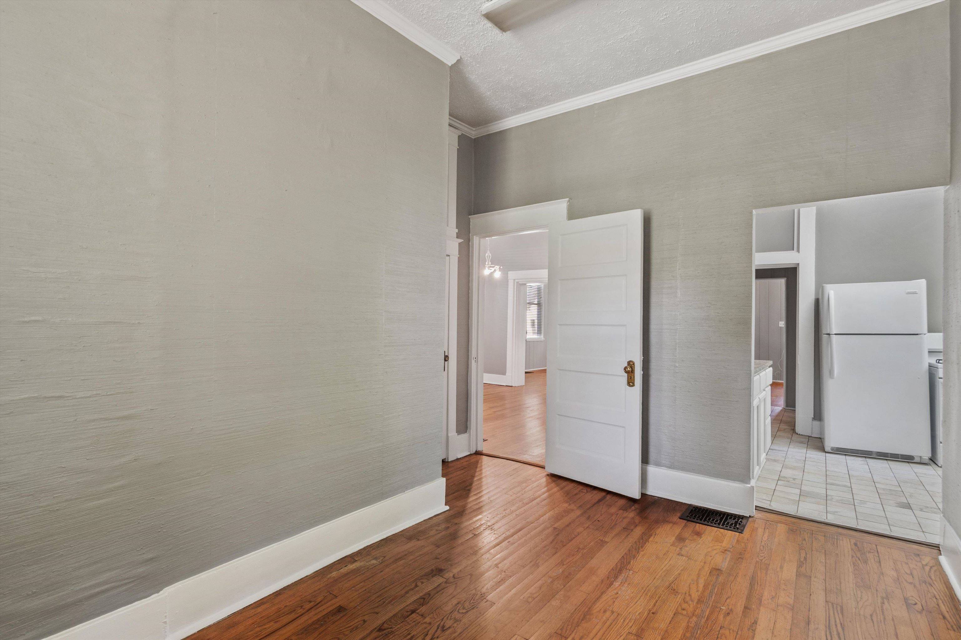 1983 Harbert Avenue Memphis, TN 38104 - Photo 6 of 40 a view of wooden floor in an empty room