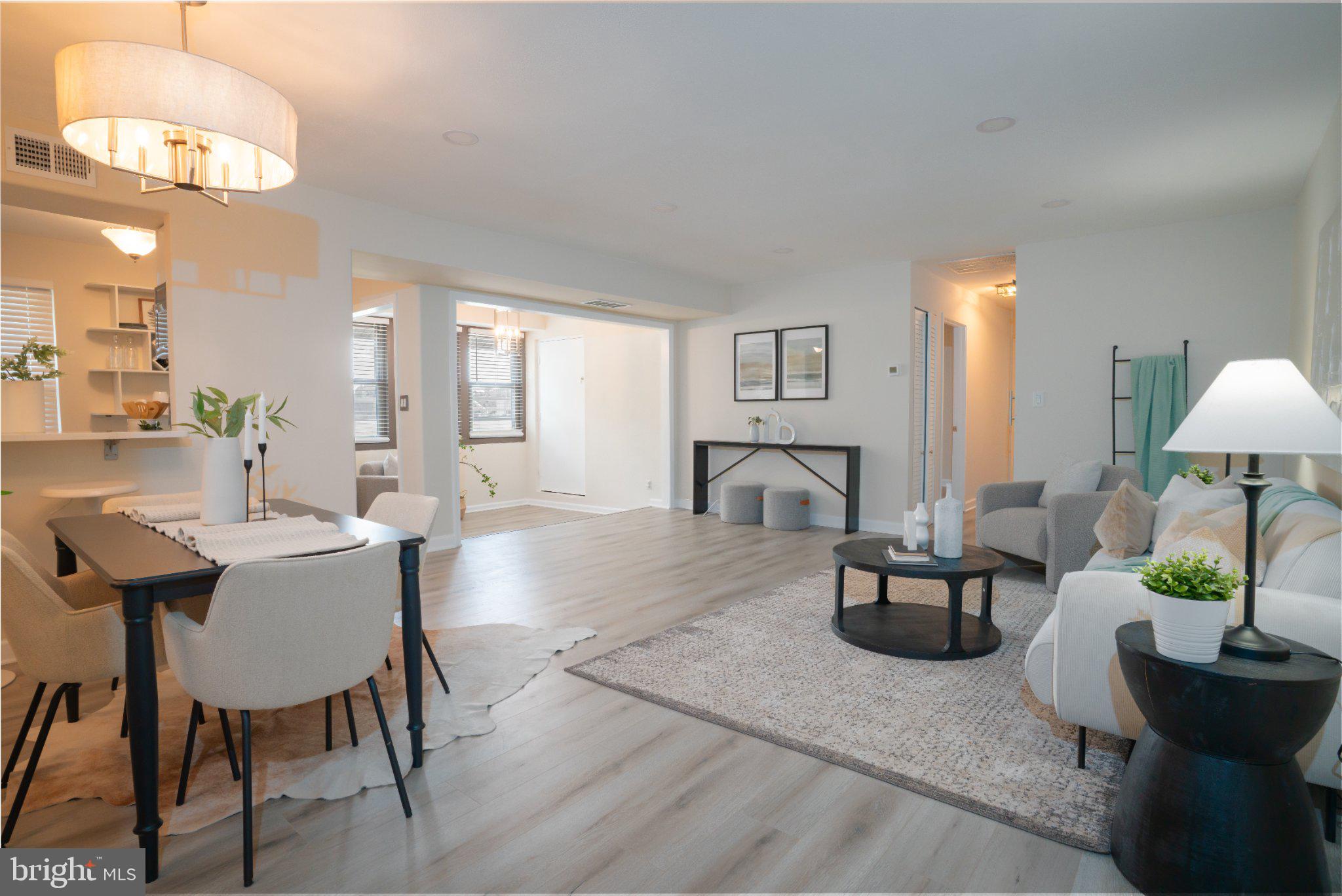 5860 Thunder Hill Road, Unit C1 Columbia, MD 21045 - Photo 15 of 22 Bright and airy open living space.