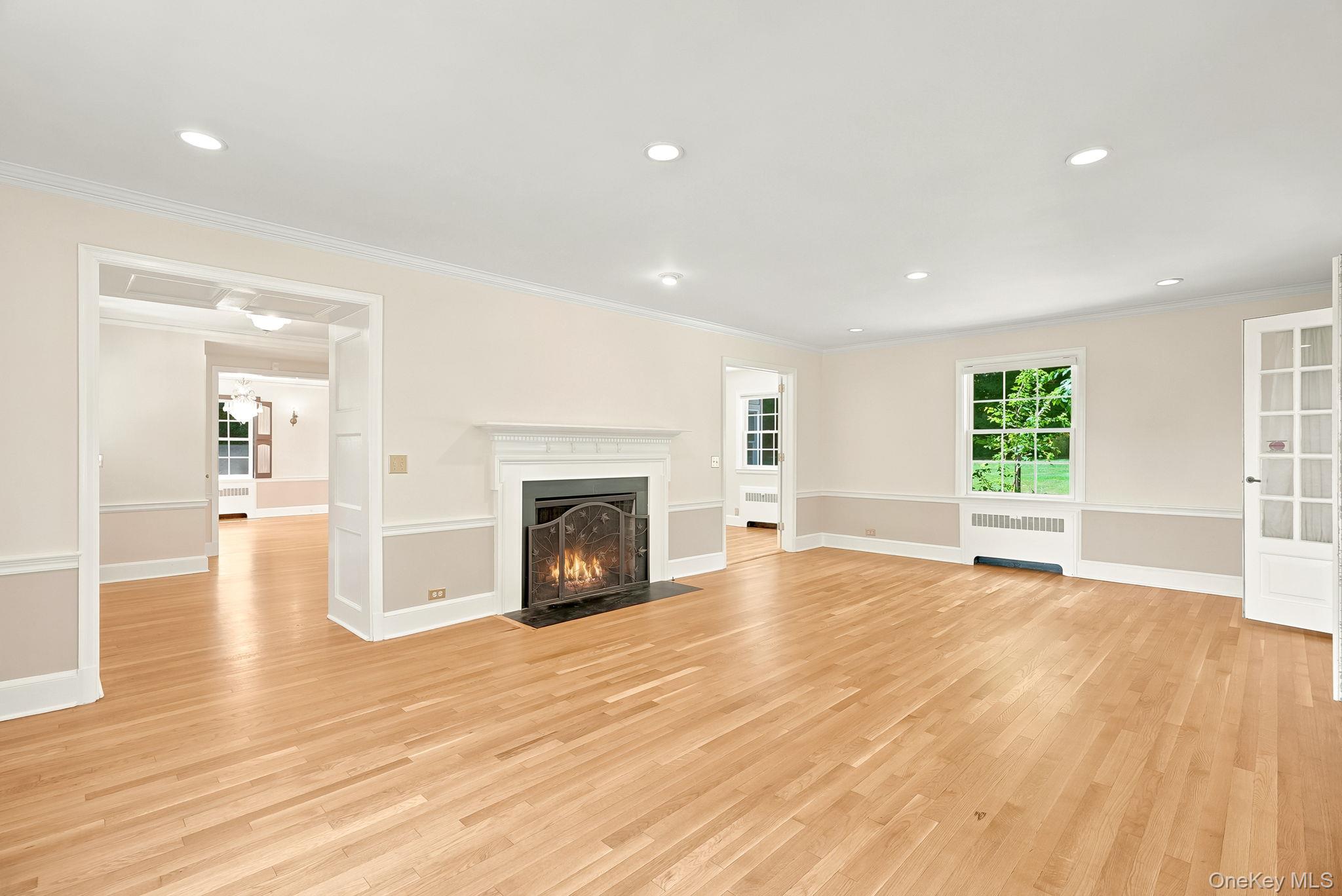 1 Sheridan Road Scarsdale, NY 10583 - Photo 5 of 40 Large, elegant Living Room with woodburning fireplace
