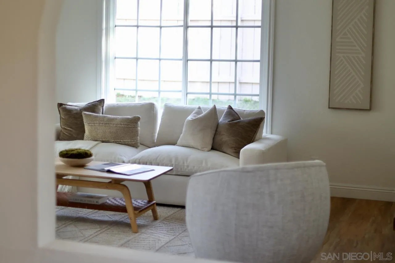 8907 Taurus Place San Diego, CA 92126 - Photo 15 of 40 a living room with furniture and a window