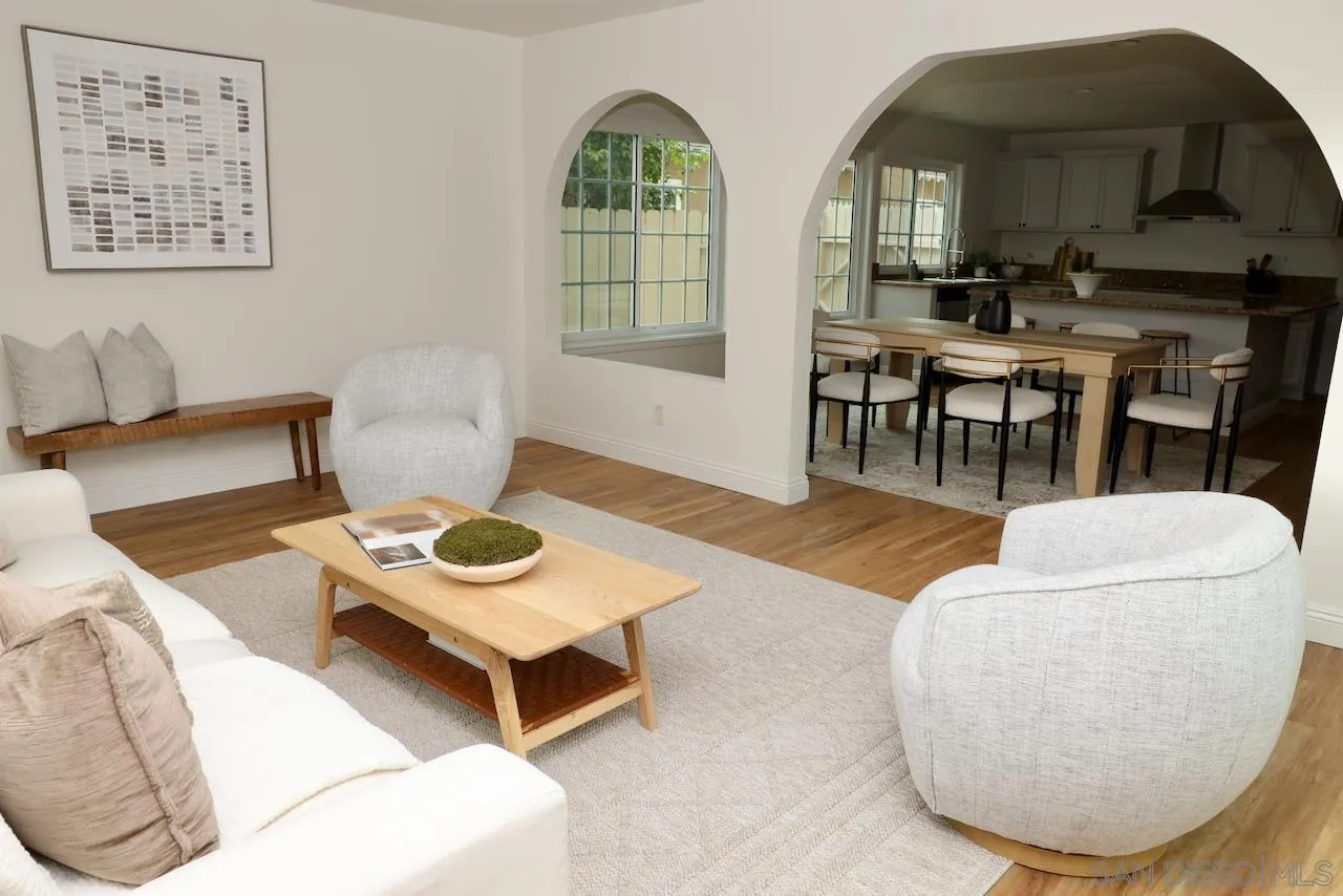8907 Taurus Place San Diego, CA 92126 - Photo 17 of 40 a living room with furniture and a wooden floor