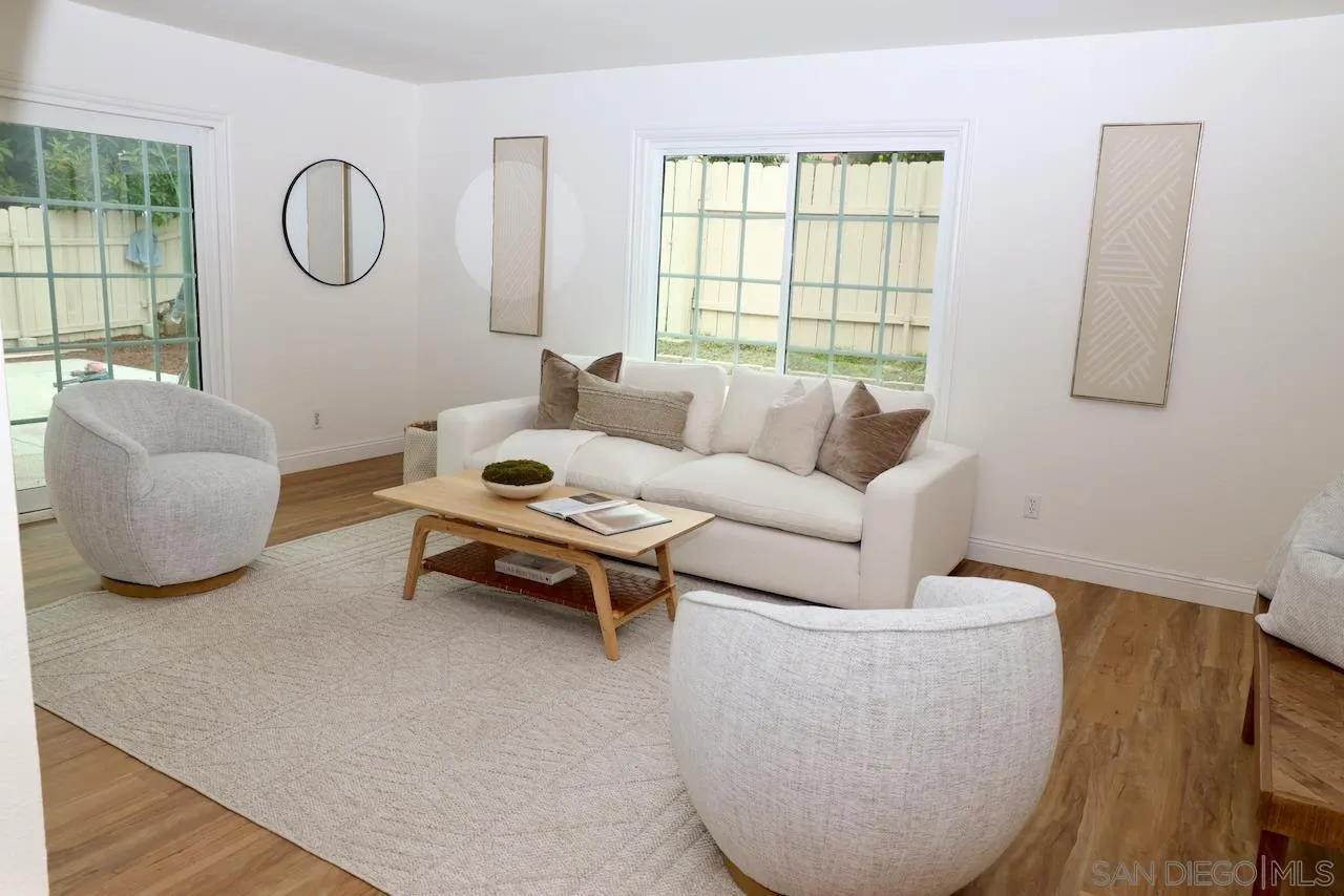 8907 Taurus Place San Diego, CA 92126 - Photo 18 of 40 a living room with furniture and a window