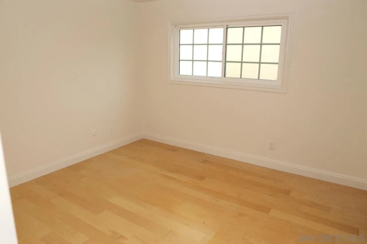 8907 Taurus Place San Diego, CA 92126 - Photo 24 of 40 an empty room with a window