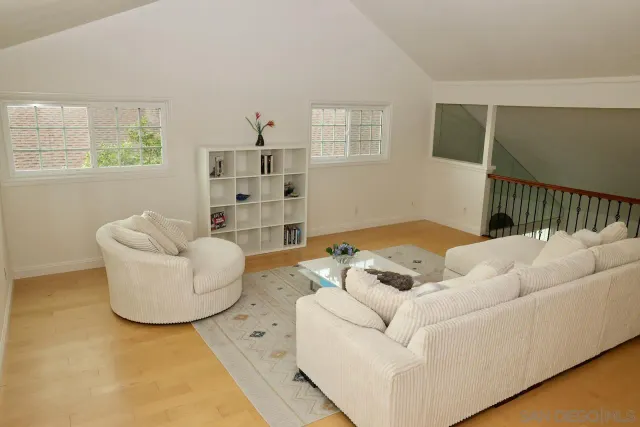 a living room with furniture and a couch