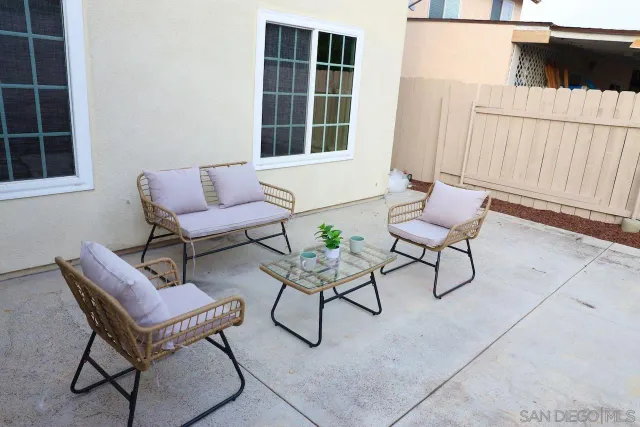 a outdoor living space with furniture and a window